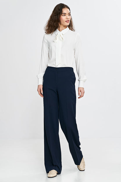 Luxurious women's trousers by Nife, showcasing a modern wide-leg design, crafted from soft materials for all-day comfort and sophistication.