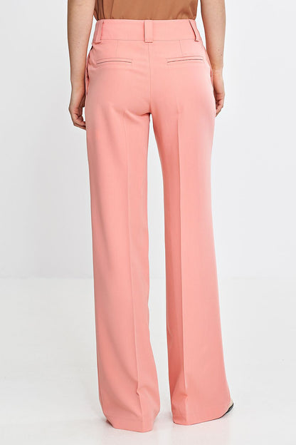 Chic Nife women's trousers showcasing an elegant design with classic side pockets and a wide belt, crafted for comfort and refined style.