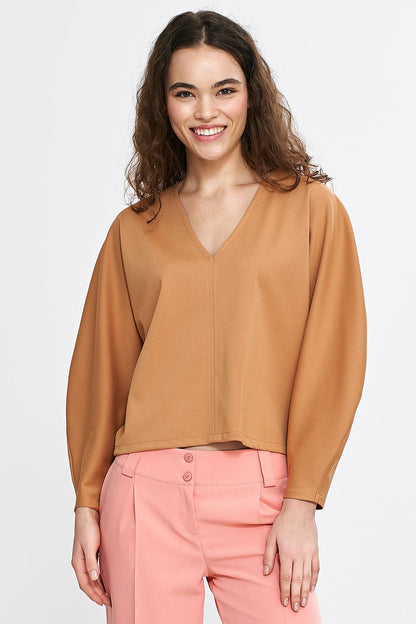 Elegant Nife oversized V-neck blouse featuring balloon and batwing sleeves in a soft viscose blend, perfect for sophisticated styling.