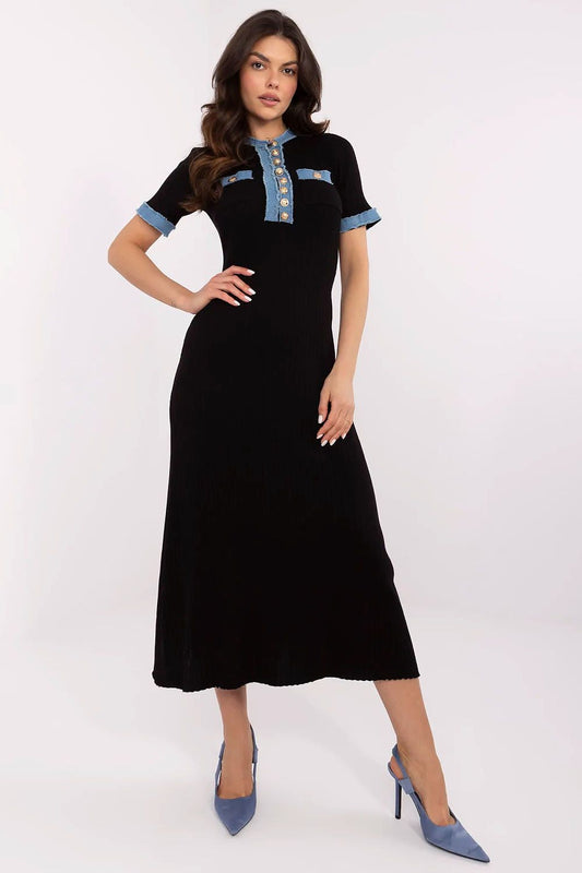 Elegant knitted midi dress by NM, showcasing a classic round neckline and ribbed texture in soft viscose-polyamide blend, perfect for everyday and office wear.