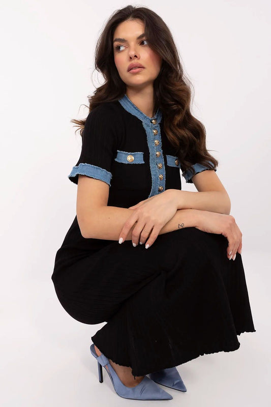 Front view of sophisticated knitted midi dress by NM, featuring delicate button fastening, ideal for enhancing feminine silhouette with comfortable fit.