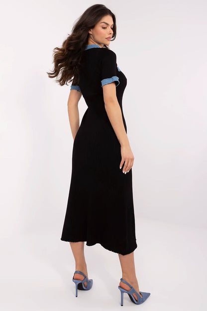 Versatile NM midi dress displayed in elegant style, highlighting its smooth material and short sleeves, suitable for any formal or casual occasion.