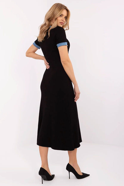 Chic and sophisticated view of the NM pencil midi dress, showcasing its stylish button fastening and flattering silhouette, perfect for formal occasions and everyday elegance.