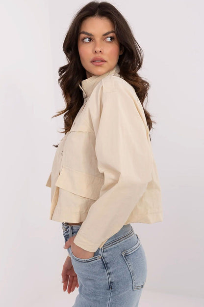 Elegant Women's Windbreaker Jacket by NM, crafted from durable polyester with minimalist design and practical features, ideal for casual everyday wear.