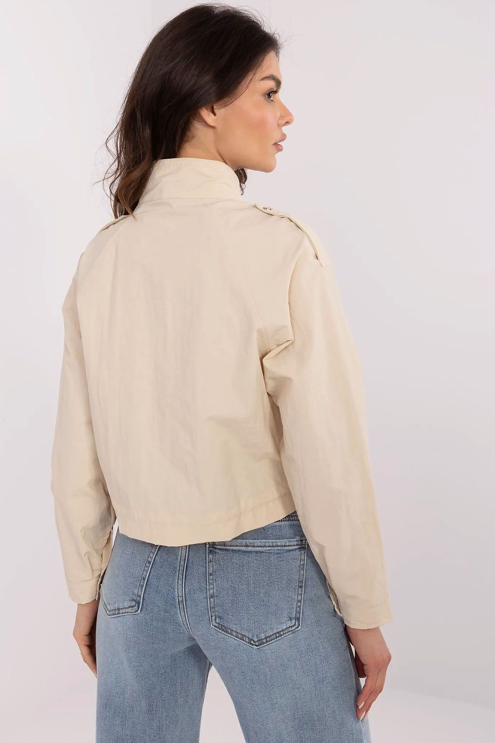 Sophisticated NM Women's Windbreaker Jacket, featuring long sleeves and imitated pockets, designed for comfortable and functional spring/summer fashion.