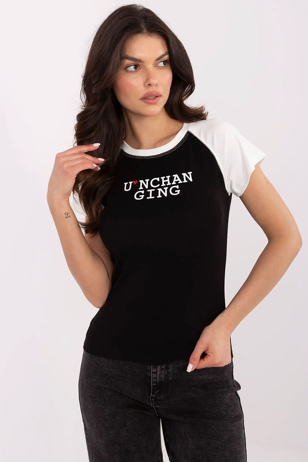 Elegant NM Ladies' Casual T-Shirt in soft ribbed cotton featuring a chic print, perfect for modern style.