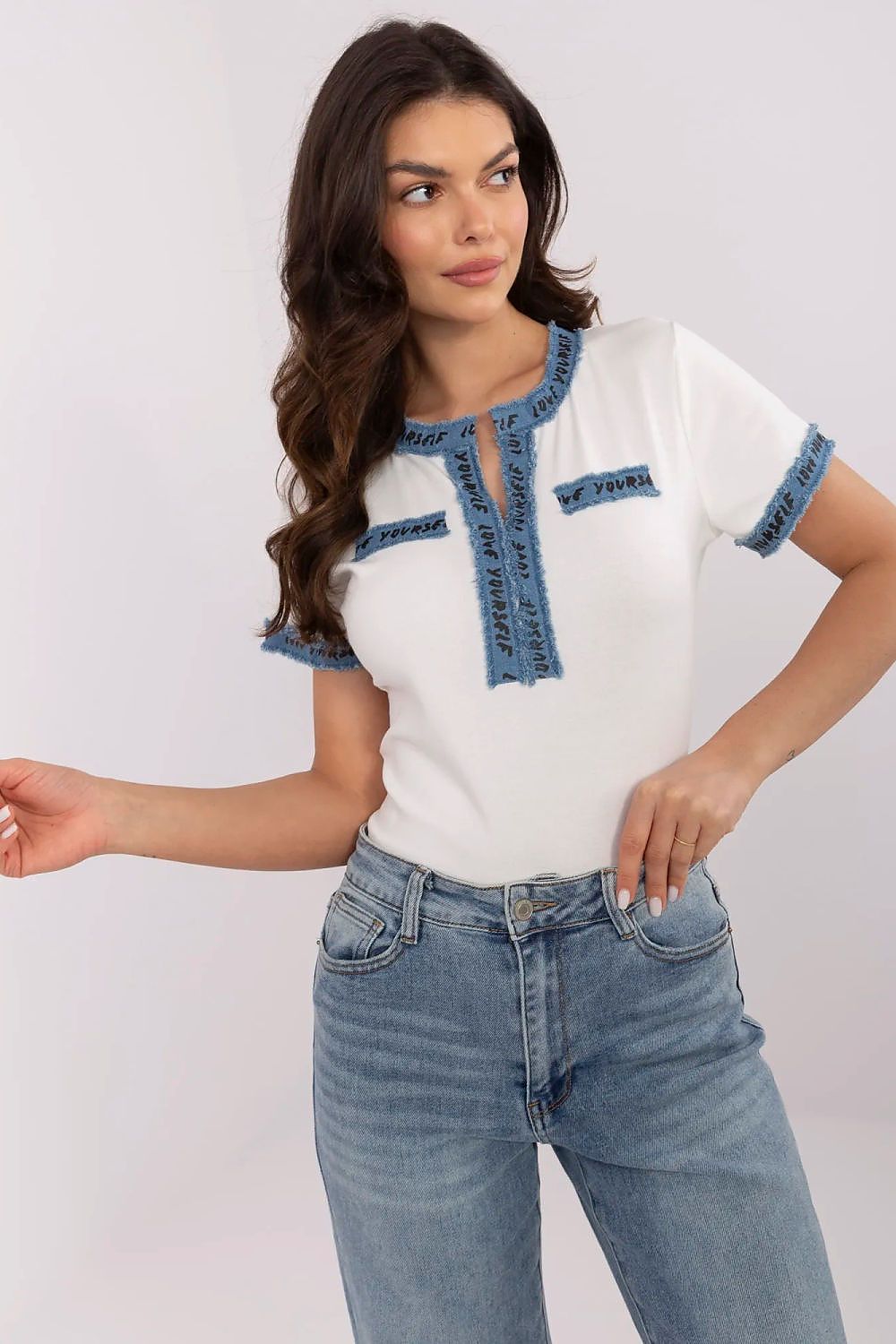 Luxury fitted cotton blouse with denim finish in casual V-neck style by NM. Ideal for elegant everyday wear, showcasing premium craftsmanship and a flattering silhouette.