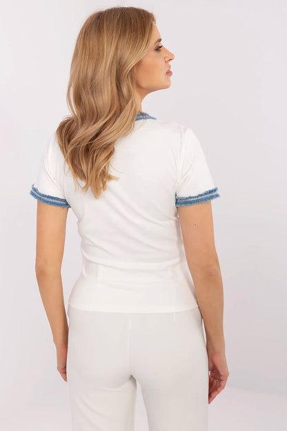 Luxurious denim finish blouse by NM, highlighting a fitted silhouette and feminine V-neck, perfect for creating stylish outfits in EU size 0.