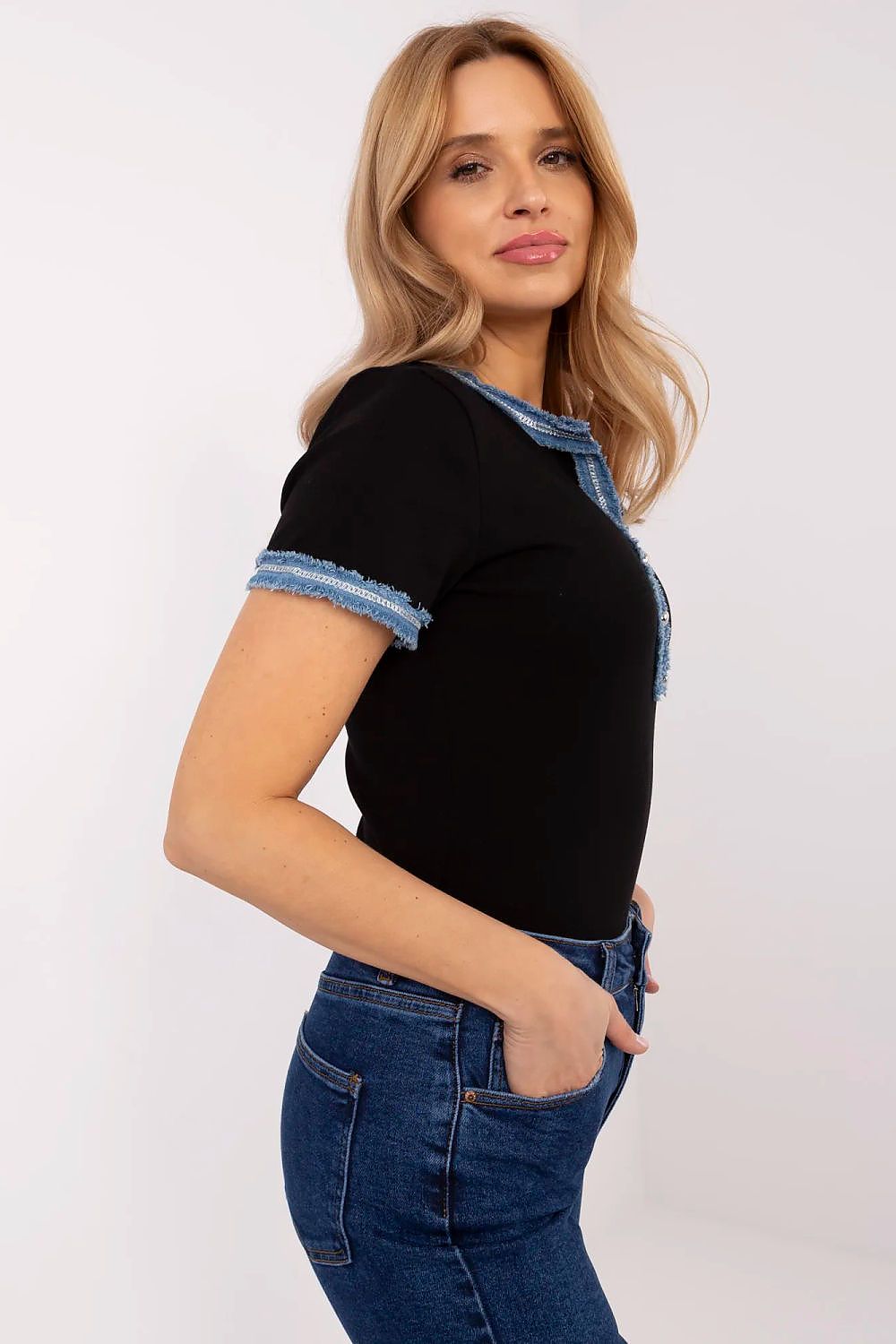 Close-up of NM decorative buttons on a luxurious fitted V-Neck blouse made of cotton blend, showcasing exquisite detail.