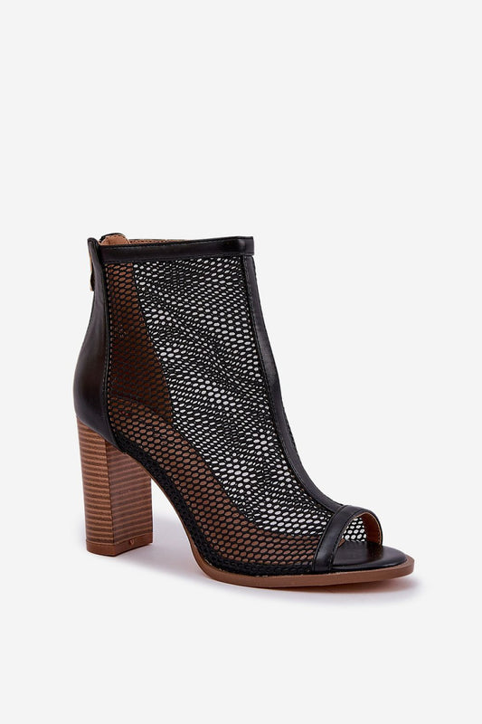 Step in Style's chic women's summer sandals with a decorative mesh upper and supportive block heel, ideal for stylish comfort.