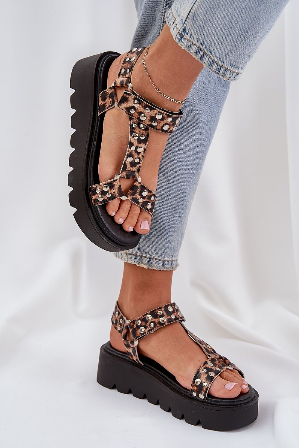 Chic women's sandals made from eco leather, showcasing fashionable embellishments, brought to you by Step in Style.