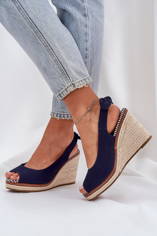 Elegant women's comfortable wedge sandals by Step in style, featuring a trendy braided design, perfect for summer outings.