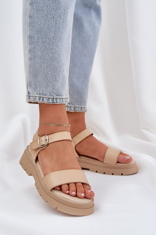 Elegant eco-friendly women's sandals by Step in Style featuring an adjustable ankle strap and flat heel, perfect for summer.