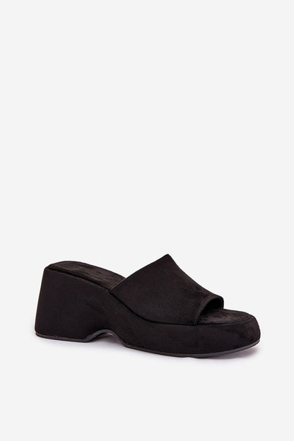 Close-up of Step in Style's luxurious imitation suede wedge sandals, highlighting intricate detailing and superior craftsmanship for all-day comfort.