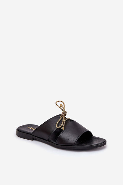 Stylish flat heel women's natural leather sandals from Step in Style, adorned with a chic golden cord, ideal for sunny days and versatile summer fashion.