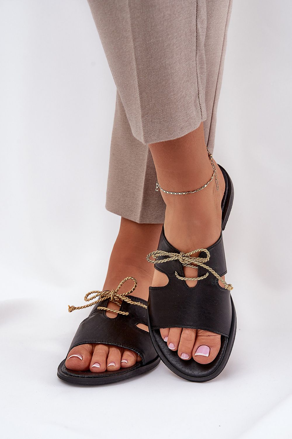 Step in Style women's leather sandals embodying elegance with a golden cord accent, designed for comfort and available in EU sizes 35-41 for a perfect fit.