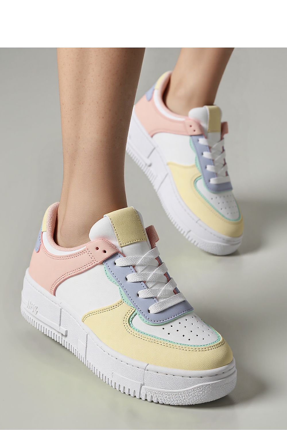 Luxurious Oasis Multe Women's Pastel Sneakers by Inello, featuring a vibrant pastel eco-leather upper and white sole, perfect for stylish casual wear.