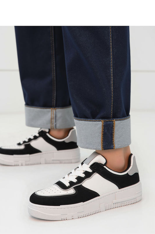 Oasis Black women's eco-leather sneakers with comfortable sole, showcasing an elegant minimalist design, by Inello.