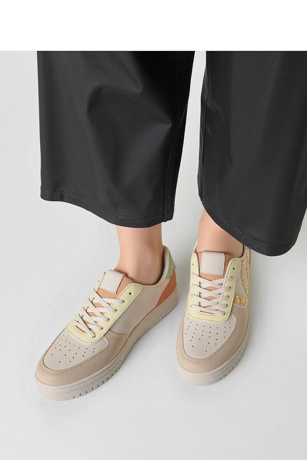 Close-up view of LORENEX Beige Sneakers from Inello, showcasing the luxurious synthetic leather upper and comfortable rubber sole.