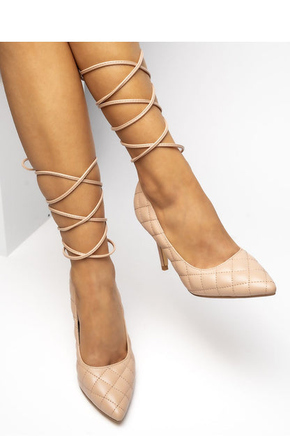 Cora Nude High Heels by Inello displayed elegantly, accentuating the slender ankle tie and high heel for a chic silhouette.