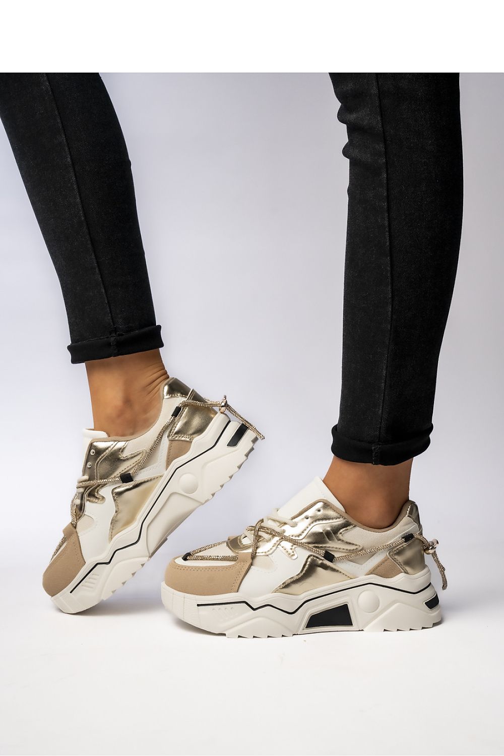 Elegant side view of Inello's Veyra Beige Women's Sneakers, featuring a unique blend of fabric and synthetic leather with an ergonomic fit.