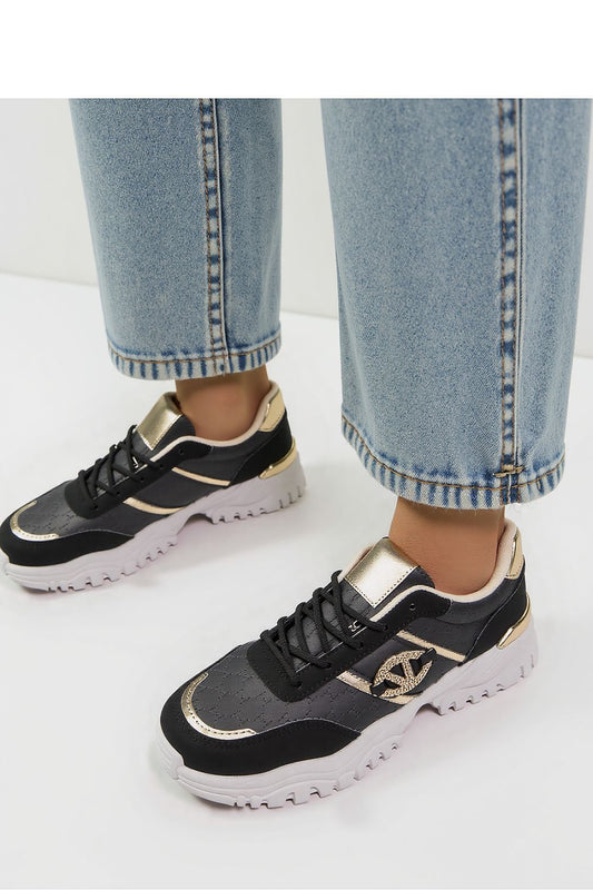 Stylish close-up of Women's Blush Black Sneakers from Inello, highlighting the eco-leather finish and luxurious gold accent details.