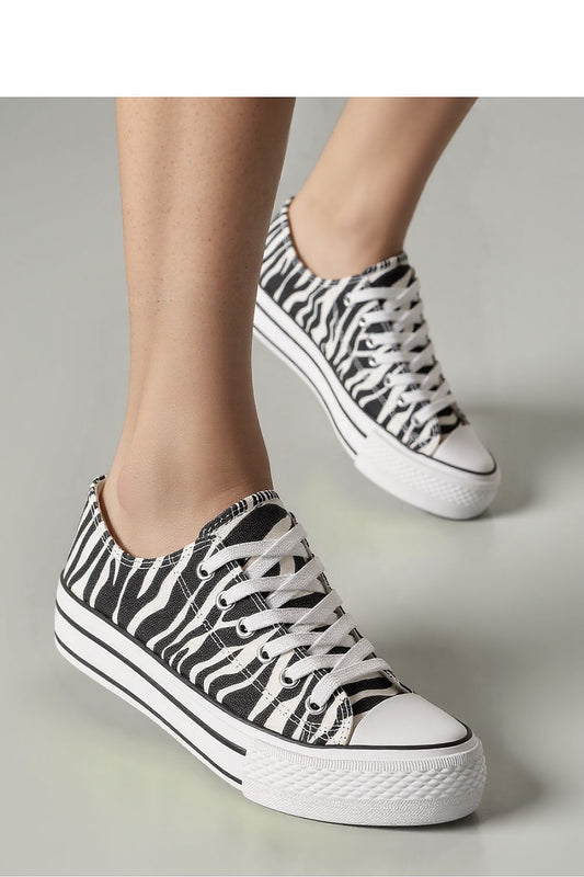 Stylish close-up of Inello Savana Zebra Sneakers, featuring an elegant zebra stripe pattern on lightweight textile material.