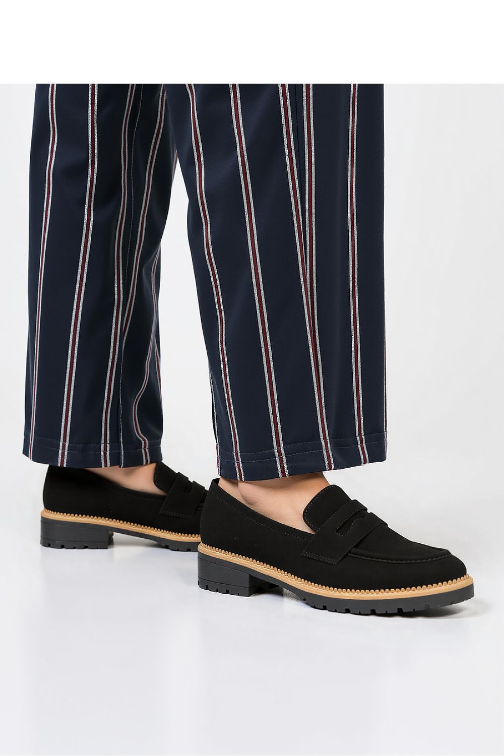 Elegant display of Lorien Black Moccasins from Inello, highlighting the timeless design suitable for both casual and formal occasions.