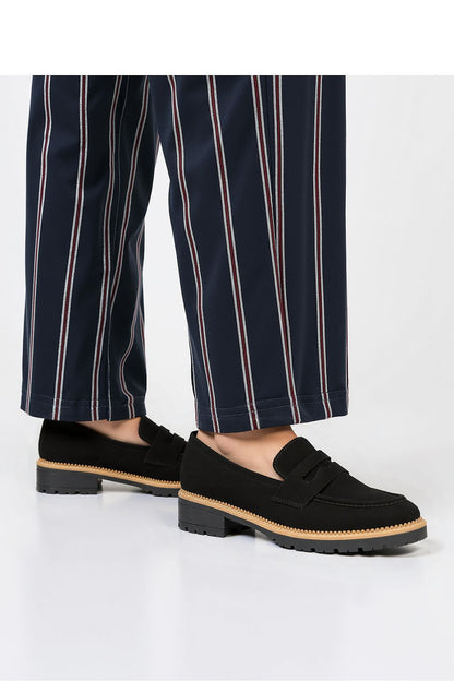 Elegant display of Lorien Black Moccasins from Inello, highlighting the timeless design suitable for both casual and formal occasions.