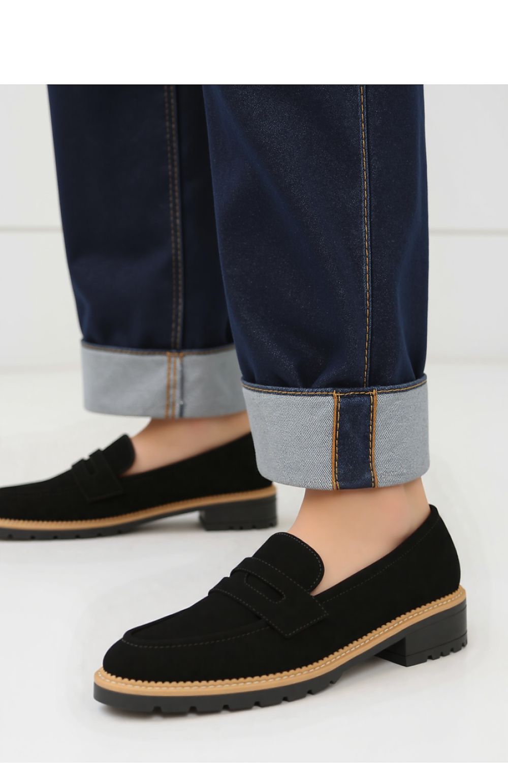 Lorien Black Moccasins by Inello, featuring luxurious faux suede material with an elegant beige sole, perfect for stylish comfort in any occasion.