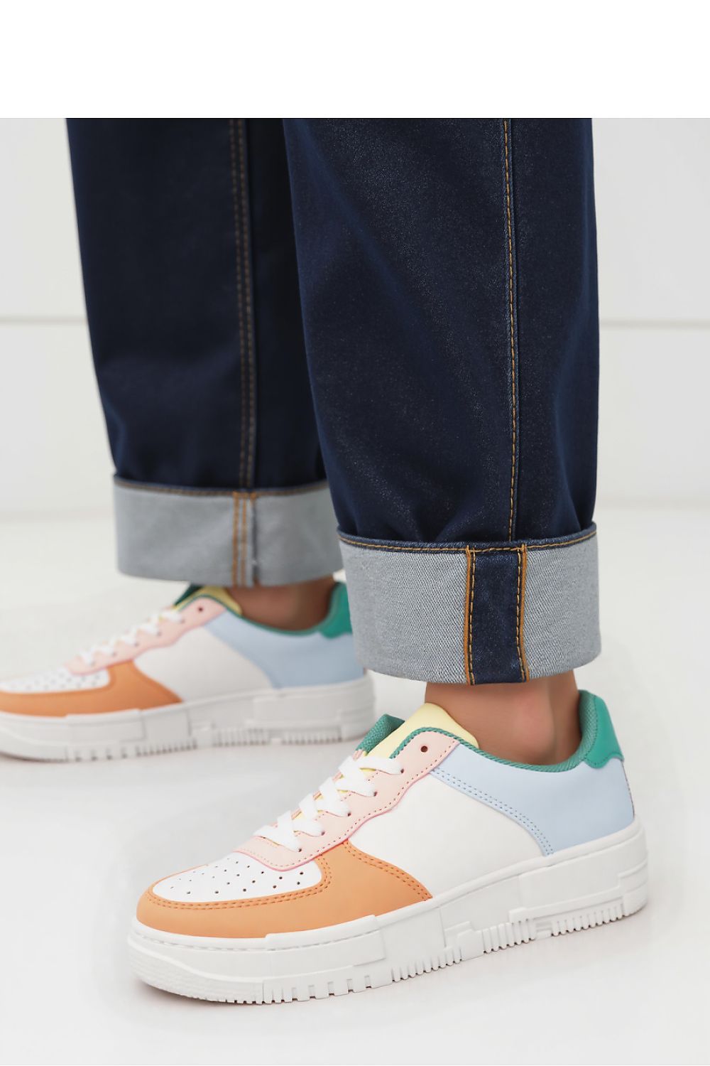 Elegant Vexana Orange Sport Sneakers featuring a unique pastel combination, providing high-quality comfort and style for women by Inello.