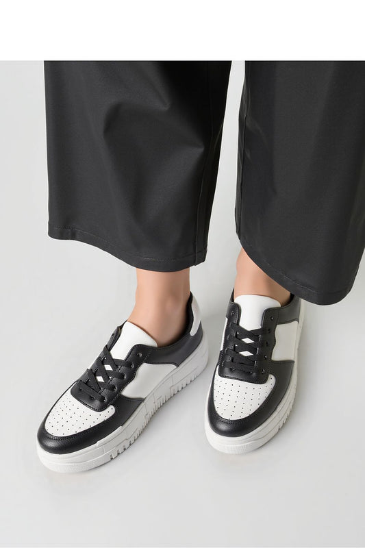 Inello Vexana Black Eco-Leather Sneakers for Women featuring a sleek design and thick rubber sole, perfect for elegant casual attire.