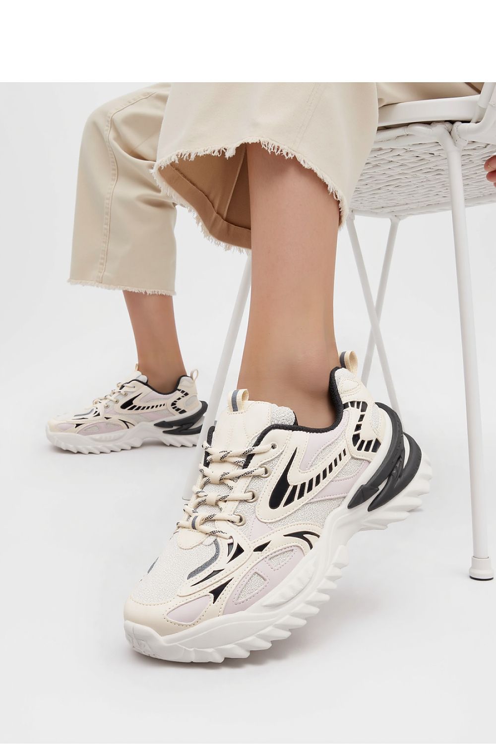 Close-up of JAYDEN Beige Sport Sneakers from Inello, highlighting the bold dynamic sole and eco-friendly materials, ideal for modern streetwear.