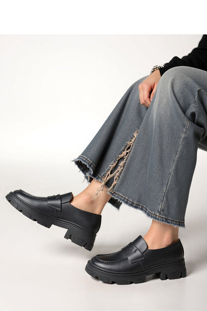 Close-up view of Inello Monza Nero loafers, highlighting exquisite craftsmanship and stylish synthetic leather finish.