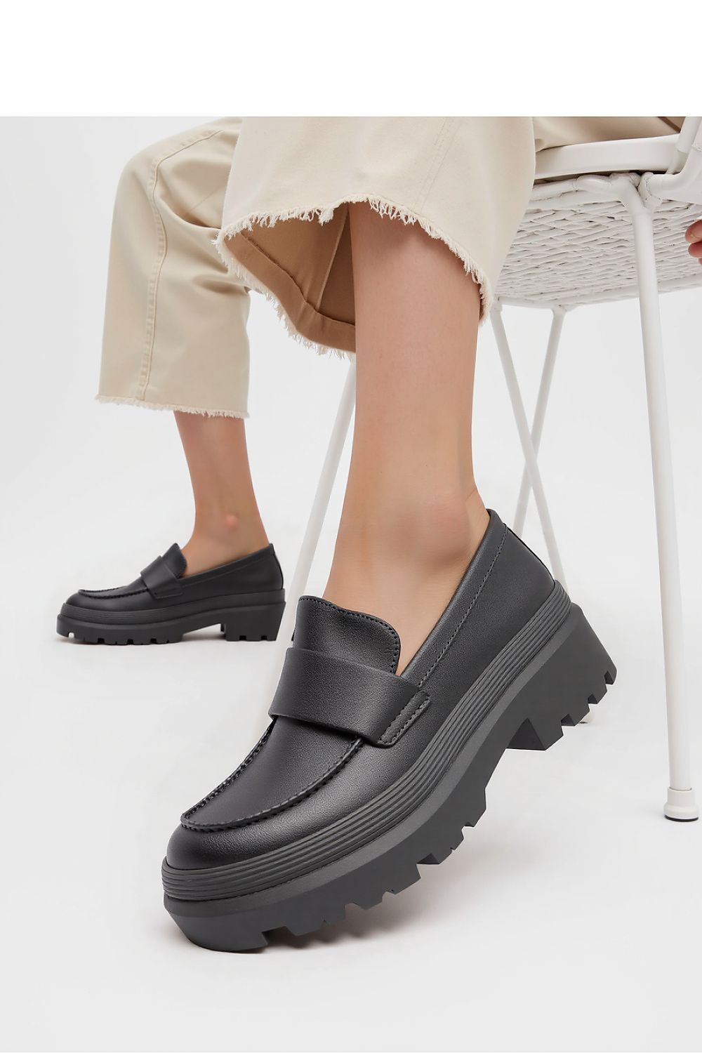 Elegant Inello CARRERA Nero women's moccasins featuring a chunky sole, perfect for stylish casual or formal wear.