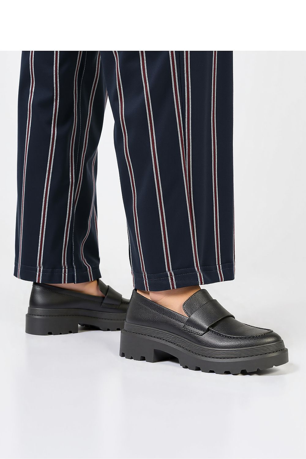 Stylish Inello CARRERA Nero moccasins for women, designed with a chic chunky sole for enhanced comfort and luxury.