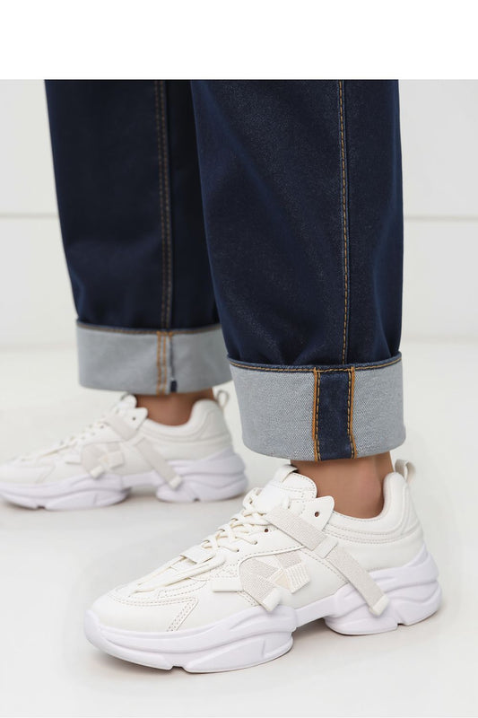 Elegant close-up of Inello Titan White Platform Sneakers, highlighting the synthetic leather and textile materials used in a luxurious white finish.