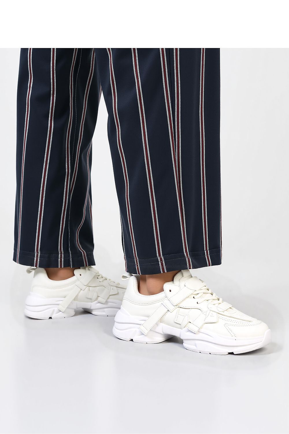 Side view of Inello Titan White Platform Sneakers, displaying the massive white platform sole designed for both comfort and style.