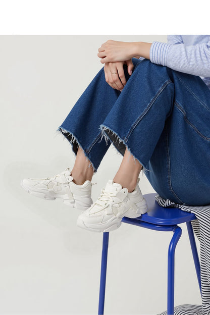 Inello Titan White Platform Sneakers styled for streetwear, emphasizing their solid construction and fashionable appeal for everyday wear.