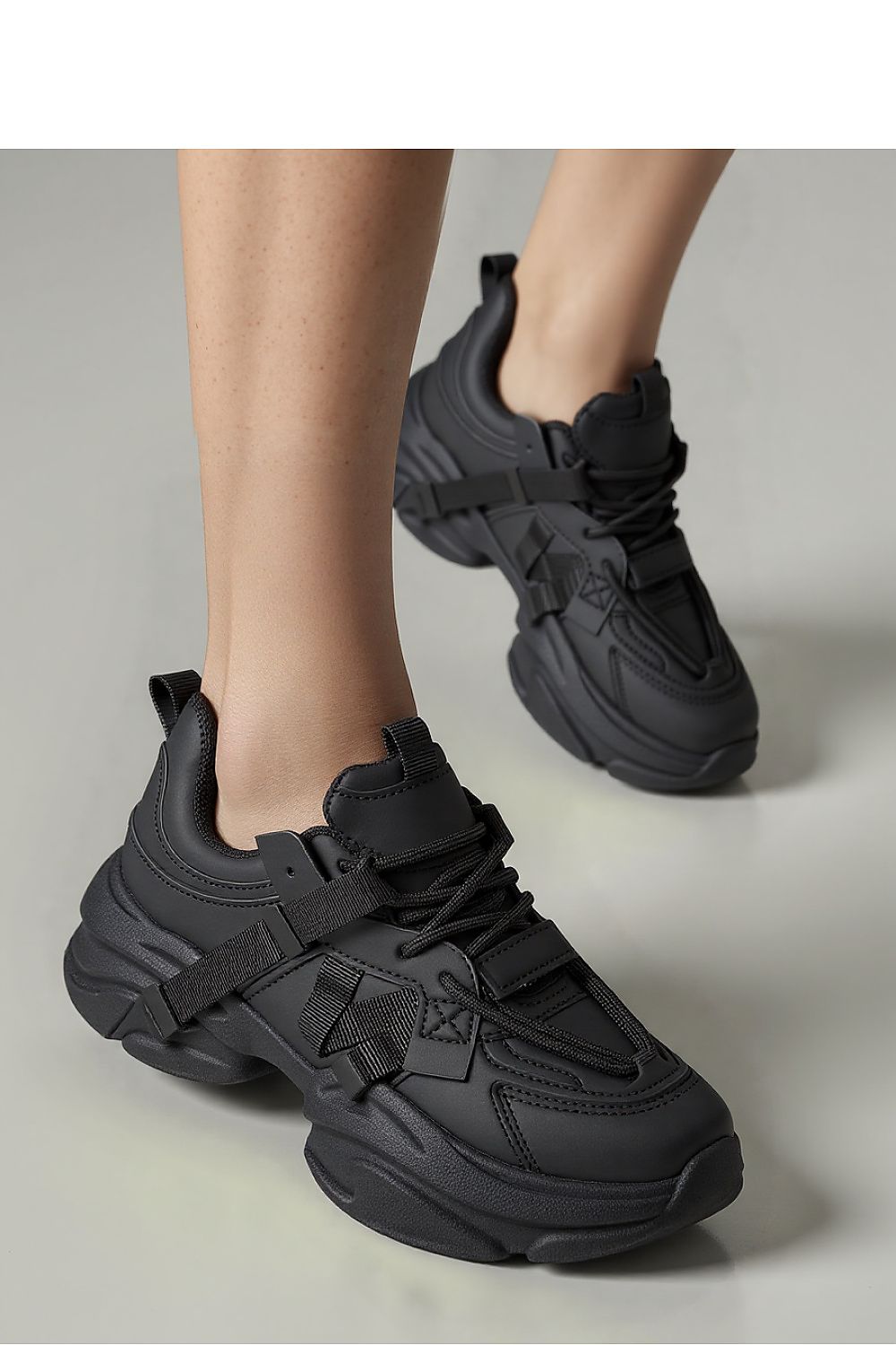 Titan Black Futuristic Sneakers by Inello featuring a sleek synthetic leather upper and massive platform, ideal for stylish streetwear.