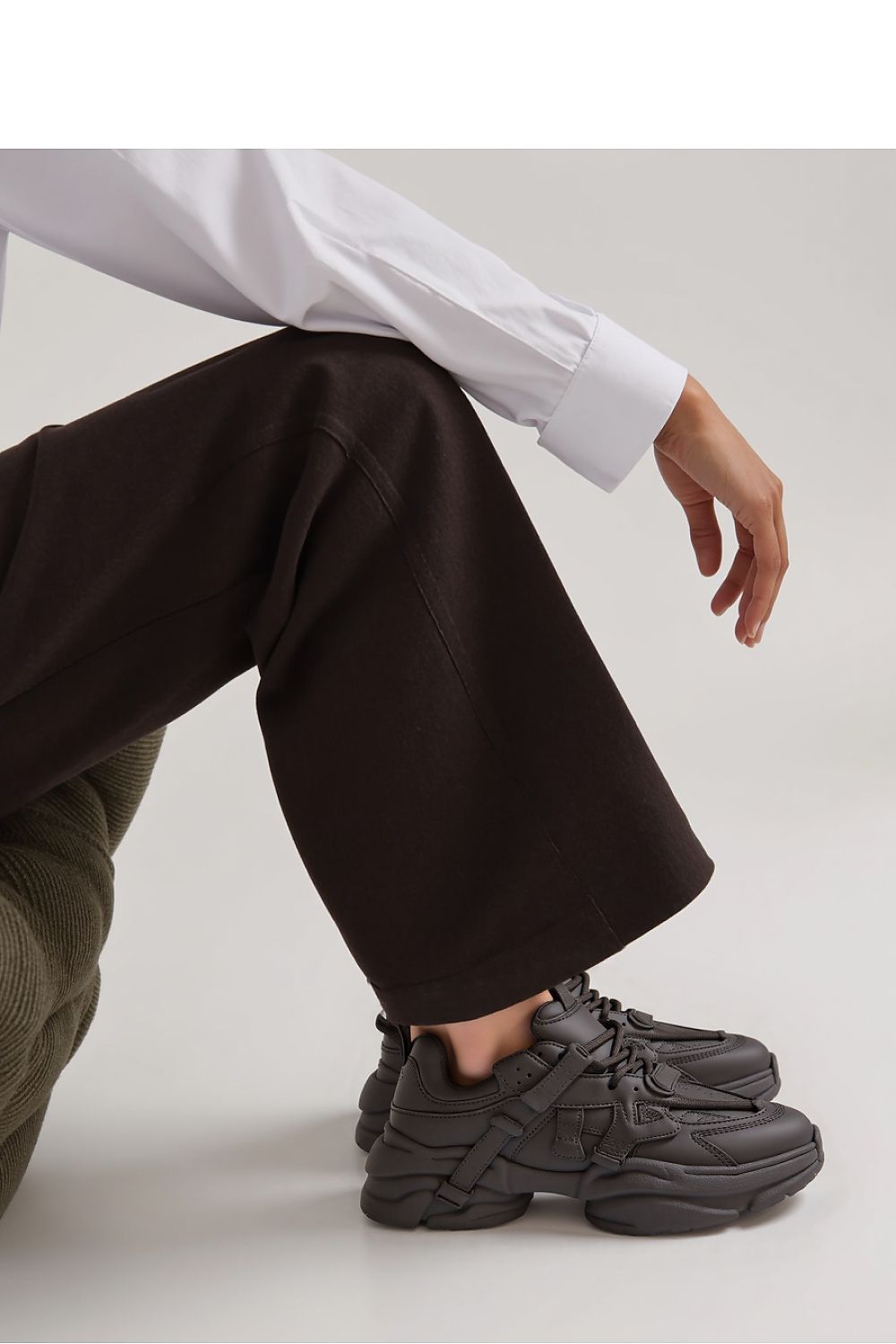 Side view of Titan Black Futuristic Sneakers from Inello highlighting their solid construction and trendy massive sole for comfort and style.