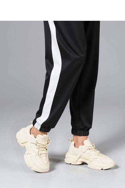 Inello Titan Beige Sneakers paired with trendy streetwear, demonstrating the perfect blend of comfort and high-fashion elegance on a massive platform.