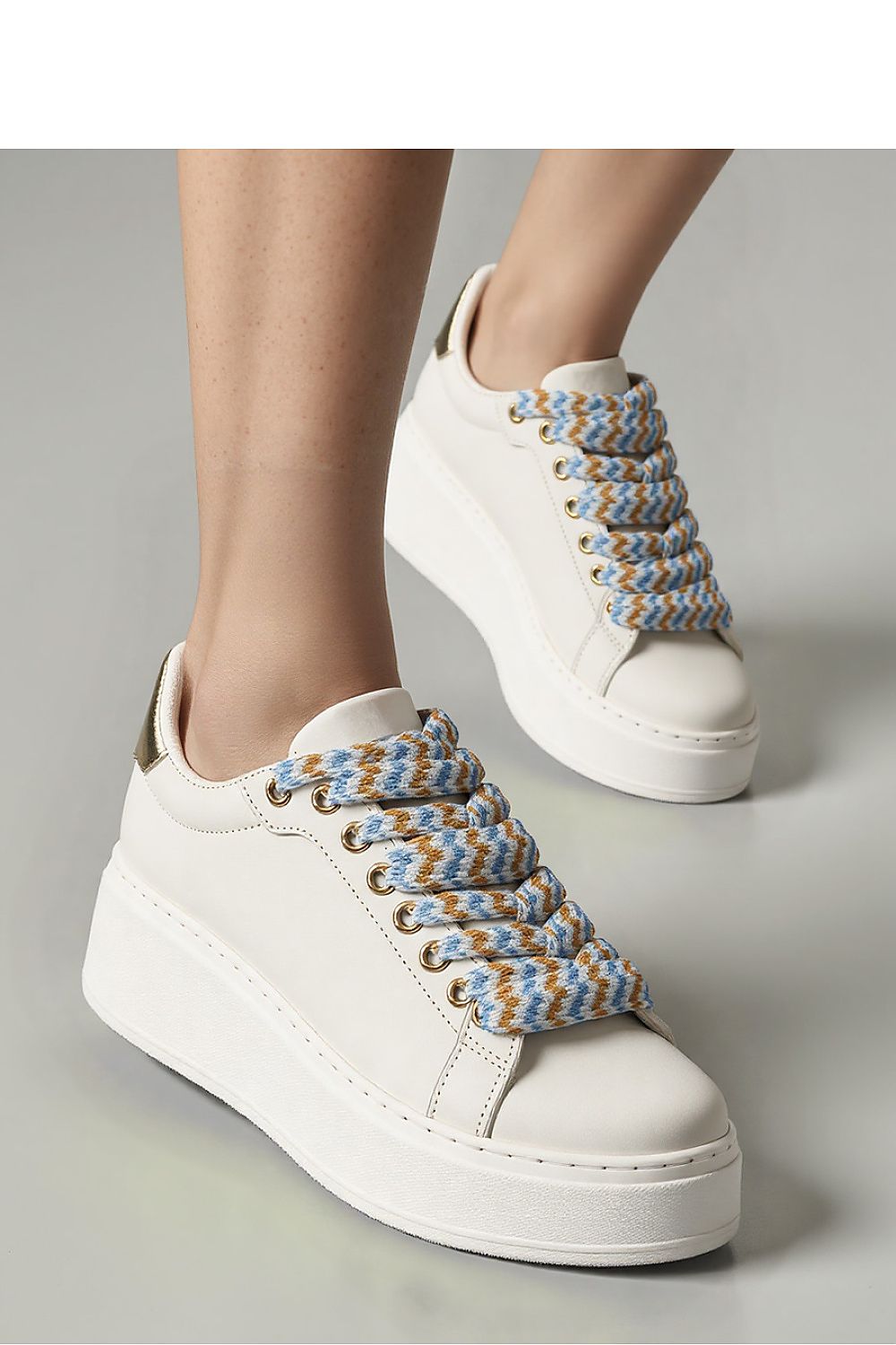 Close-up of Zarax Beige Platform Sneakers by Inello, highlighting the intricate patterned laces and premium synthetic leather craftsmanship.