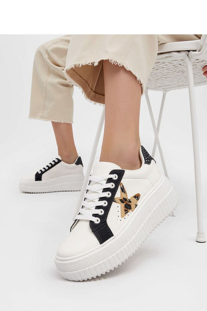 NOVAX Black Panther motif platform sneakers for women, offering stylish comfort with a luxurious black design and intricate detail, crafted by Inello.