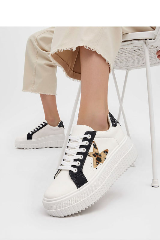 NOVAX Black Panther motif platform sneakers for women, offering stylish comfort with a luxurious black design and intricate detail, crafted by Inello.