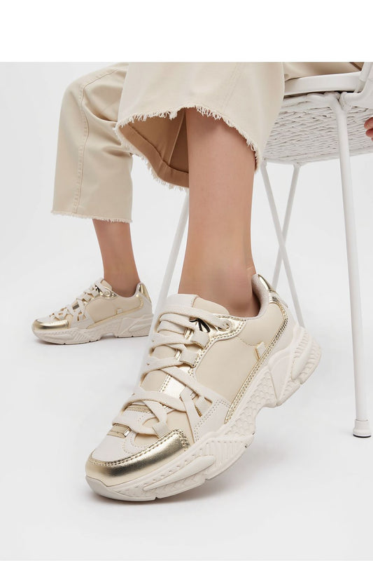 Inello Celeste Beige Sneakers featuring elegant gold accents and a chunky sole, perfect for stylish sportswear.