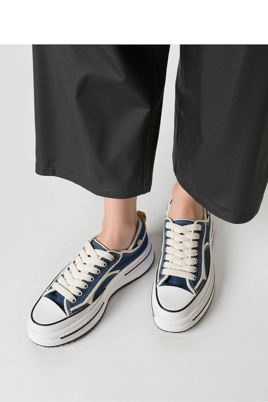 Close-up of Inello ROGUE Vintage Denim Sneakers, featuring frayed denim accents and a robust chunky sole for urban elegance.