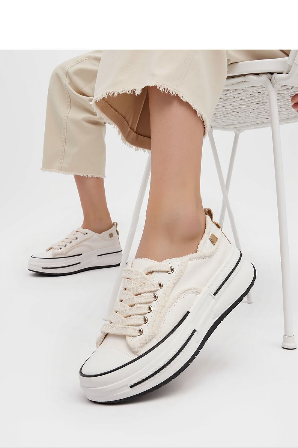 Close-up of Inello ROGUE White Chunky Sneakers highlighting the unique frayed material texture, ideal for fashion-forward street style.