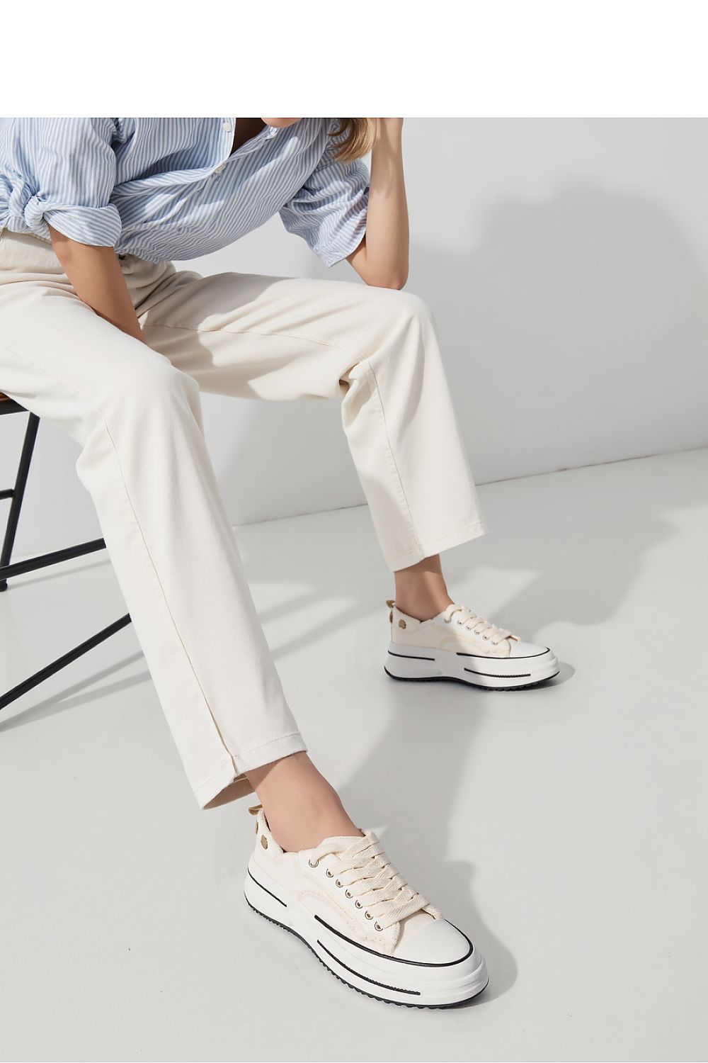 Inello ROGUE White Chunky Sneakers displayed on a stylish surface, exemplifying luxury streetwear and exquisite craftsmanship.