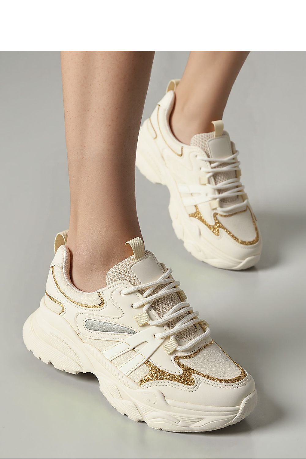 Vega Beige Sport Sneakers by Inello featuring elegant golden glitter details, showcasing a luxurious sporty design.